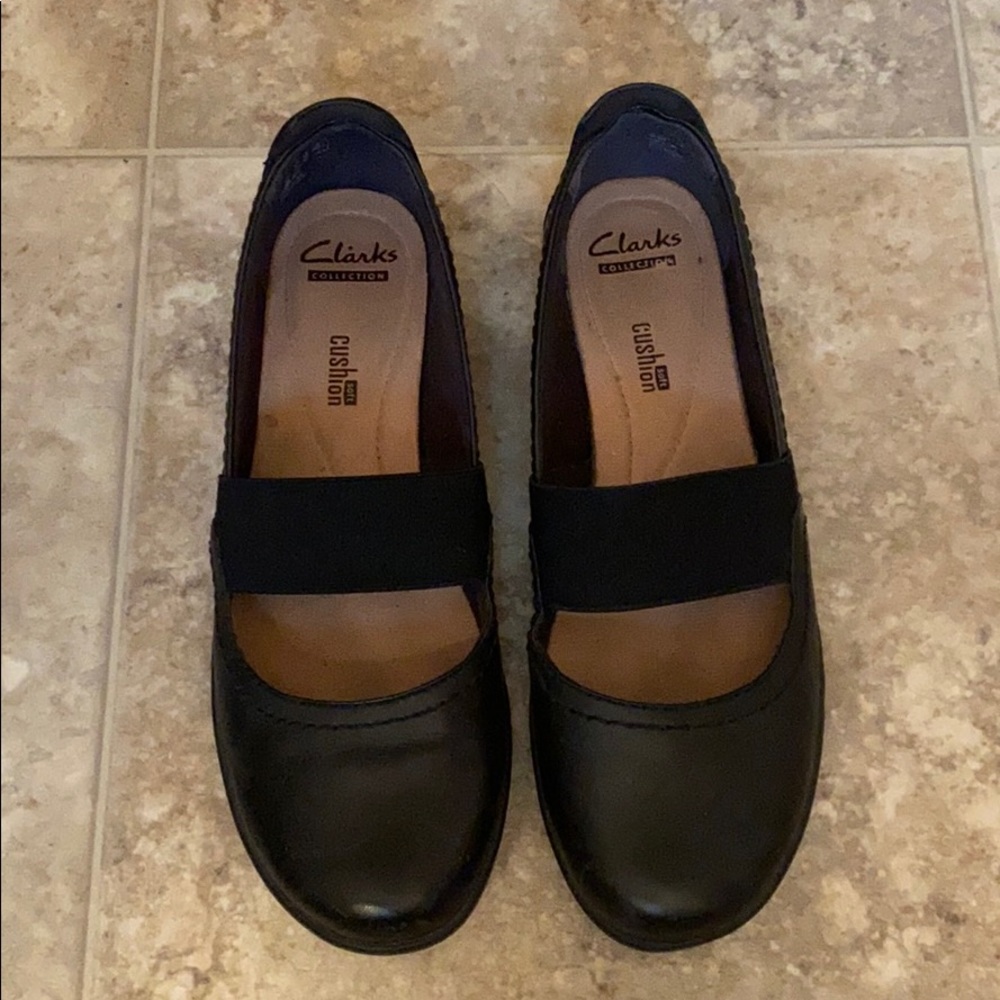 Black clarks flats.